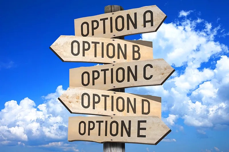 A 5 direction sign with each direction labeled as a choice