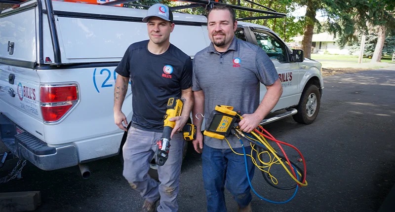 Two bills heating HVAC technicians